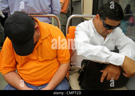 Santiago Chile,Metro de Santiago,subway station,Red Line,public transportation,train,interior inside,Hispanic Latin Latino ethnic immigrant immigrants Stock Photo