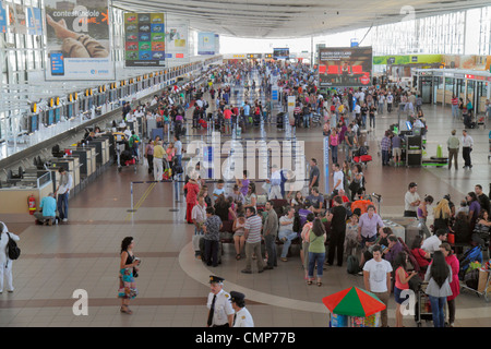 Santiago Chile,Comodoro Arturo Merino Benítez International Airport,SCL,aviation,passenger terminal,Hispanic woman female women,man men male,luggage,s Stock Photo