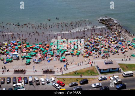 Lima Peru,Barranco District,Malecon,Circuito de playas,Playa los Yuyos,Pacific Ocean water coast,aerial view,public,beach beaches,crowd,crowded,umbrel Stock Photo