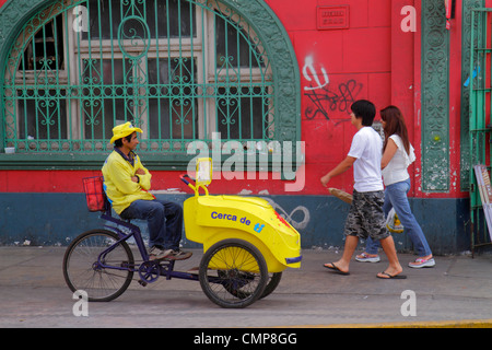 Lima Peru,Barranco District,Avenida Miguel Grau,urban street scene,street,sidewalk,Hispanic ethnic man men male,woman female women,couple,walking,ice Stock Photo