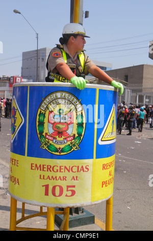 Lima Peru,San Isidro,Avenida Canaval y Moreyra,street scene,Hispanic woman female women,national police,law enforcement,uniform,reflective vest,helmet Stock Photo