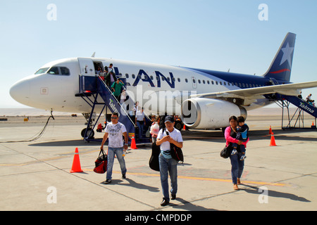 Tacna Peru,Aeropuerto Internacional Carlos Ciriani,airport,aviation,LAN flight from Lima,arrival,disembarking,Hispanic Latin Latino ethnic immigrant i Stock Photo