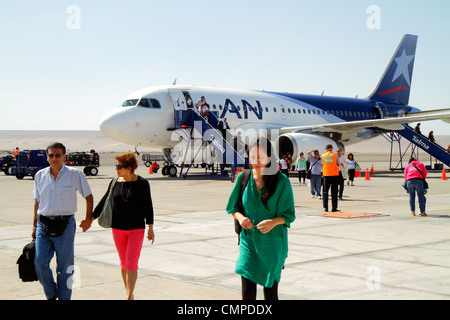 Tacna Peru,Aeropuerto Internacional Carlos Ciriani,airport,aviation,LAN flight from Lima,arrival,disembarking,Hispanic Latin Latino ethnic immigrant i Stock Photo