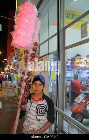 Tacna Peru,Avenida San Martin,street scene,storefront,Hispanic ethnic boy boys,male kid kids child children,teen teens teenage teenager teenagers,vend Stock Photo