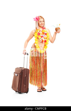 Full length portrait of an attractive young woman dressed in a hawaiian costume going on vacation isolated on white background Stock Photo