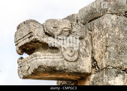 Carved stone jaguar heads adorning the buildings at Chichen Itza, Mexico. Stock Photo