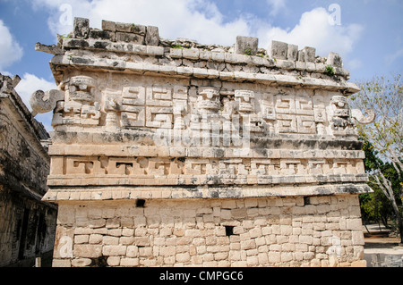 CHICHEN ITZA, Mexico - Ornately decorated building at Chichen Itza Mayan ruins in Mexico. This is the side of 'La Iglesia' in the Las Monjas complex of buildings on the site. Stock Photo