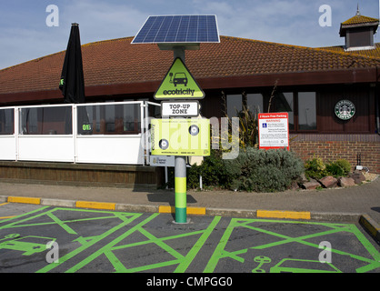 An electric car recharging point at Sedgemoor service station on the M5 in Somerset, UK Stock Photo