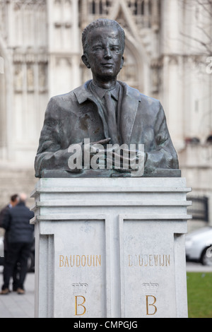Bust and statue of King Baudouin in Brussels in front of Catholic Cathedral Stock Photo
