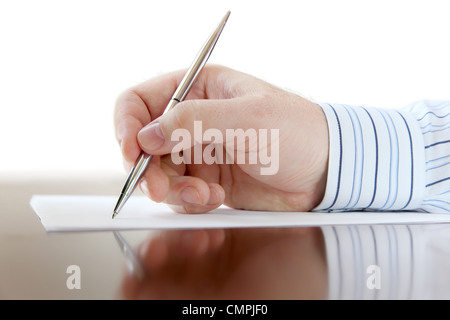 Male hand with pen Stock Photo