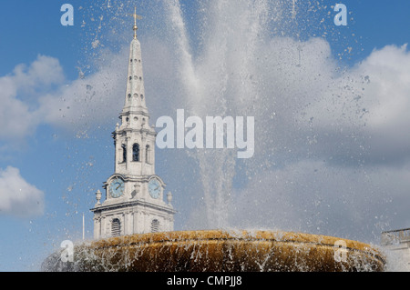 St Martin in the Fields and the Trafalgar Square fountains, London UK Stock Photo