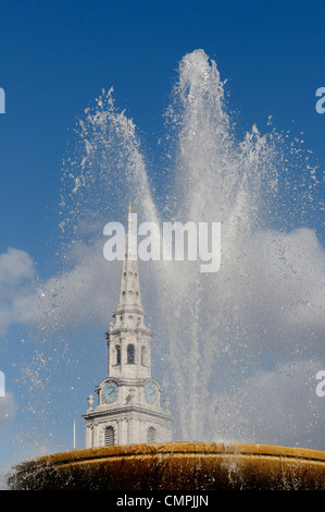 St Martin in the Fields and the Trafalgar Square fountains, London UK Stock Photo