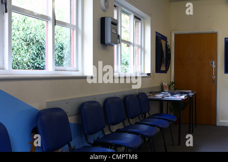 empty chairs in the waiting room of a doctors' surgery Stock Photo