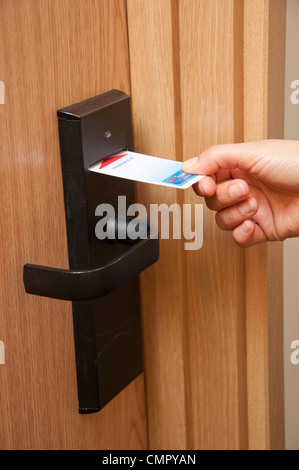 Opening a travelodge hotel room with a key card. Stock Photo