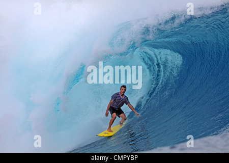 Surfing in the Mentawai Islands, Sumatra, Indonesia. Stock Photo