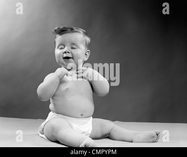 Caucasian Toddler Standing Towards Black Wearing Diapers Stock Photo -  Image of baby, caucasian: 83566746