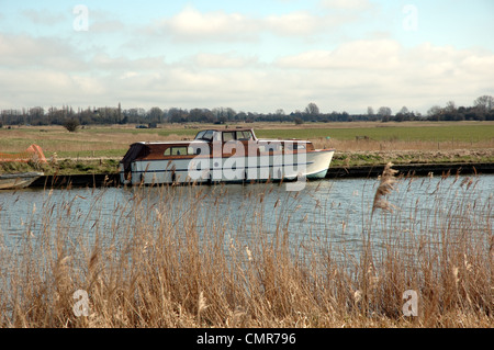 Traditional wooden Broads cruiser on the River Bure near Acle, Norfolk, Broads National Park Stock Photo