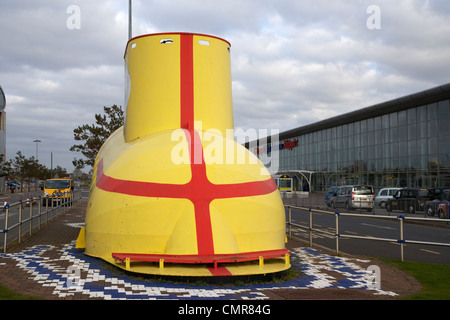 the beatles yellow submarine sculpture outside liverpool john lennon airport merseyside uk. Stock Photo