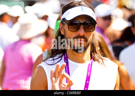 Bob Sinclar Music DJ makes an okay hand signal while walking in the grounds of Day 5 of the Sony Ericsson Open at Crandon Park. Stock Photo
