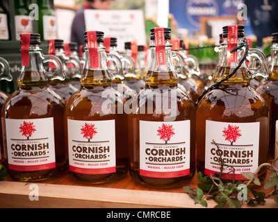 Cornwall, UK - Cornish Orchards apple juices and ciders bottles on display at market. Stock Photo