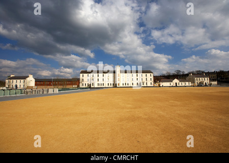 soldiers quarters with clock tower and parade ground in ebrington square former ebrington barracks british military base Derry city londonderry Stock Photo