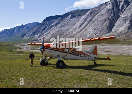 A DeHaviland Beaver owned by Coyote Air parked on the tundra in Gates of the Arctic National Park, AK, USA. Stock Photo