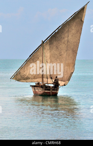 sailor on his dhow sailboat in Zanzibar Stock Photo - Alamy