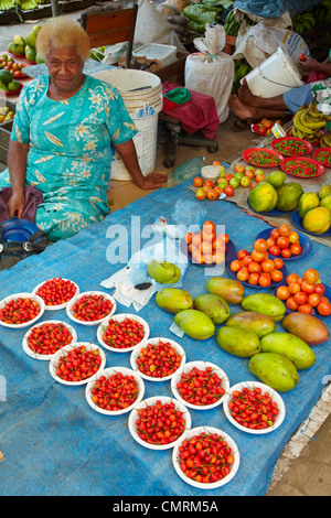 Fijian woman and her produce stall, Nadi Market, Nadi, Viti Levu, Fiji, South Pacific Stock Photo