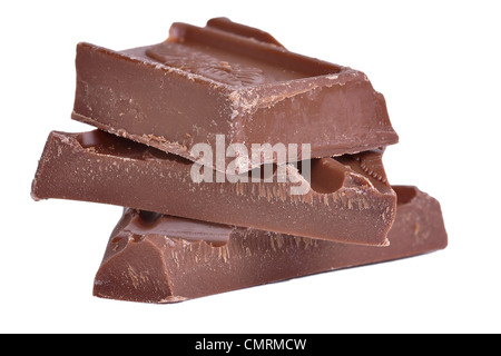 Roughly cut chunks of a chocolate bar isolated in white Stock Photo