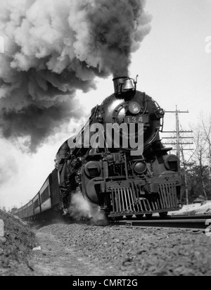 A Powerful Steam Engine Pulling a Vintage Train Stock Photo - Alamy