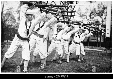 1918 US Navy Naval Sailors training to go over the top bayonet rifle Stock Photo