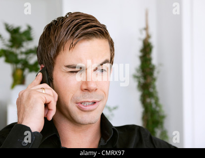 Closeup on man talking in cellphone Stock Photo