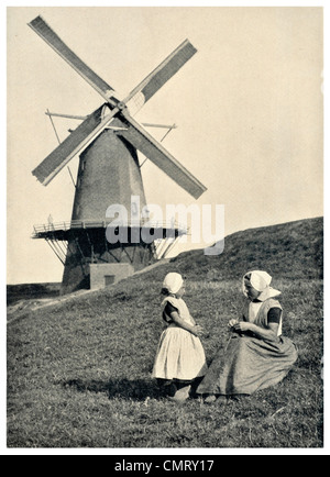 1923 Dutch Mill windmill on he Dike mother daughter Holland Stock Photo