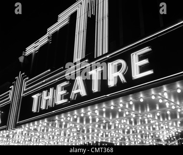 1930s 1940s THEATER MARQUEE THEATRE IN NEON LIGHTS Stock Photo