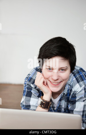 woman looking at camera and smiling Stock Photo