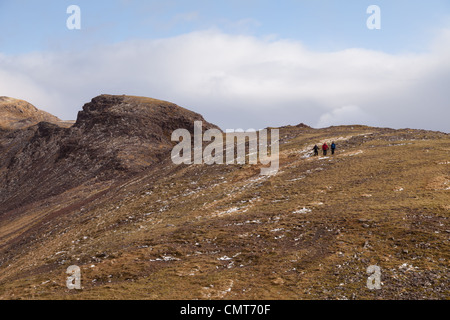 The bealach na Ba isthe third highest road in Scotland and Sgurr a' Chaorachain is a corbett that can easily be climbed from it. Stock Photo