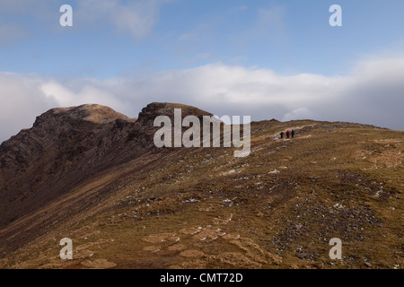 The bealach na Ba isthe third highest road in Scotland and Sgurr a' Chaorachain is a corbett that can easily be climbed from it. Stock Photo