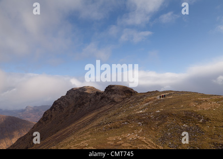 The bealach na Ba isthe third highest road in Scotland and Sgurr a' Chaorachain is a corbett that can easily be climbed from it. Stock Photo