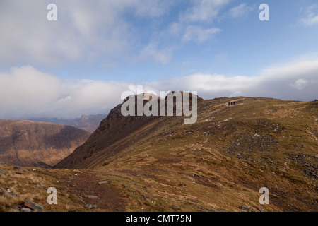 The bealach na Ba isthe third highest road in Scotland and Sgurr a' Chaorachain is a corbett that can easily be climbed from it. Stock Photo