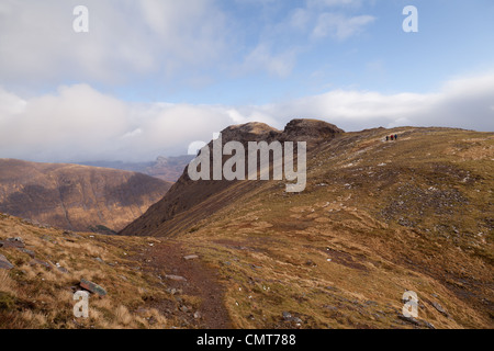 The bealach na Ba isthe third highest road in Scotland and Sgurr a' Chaorachain is a corbett that can easily be climbed from it. Stock Photo