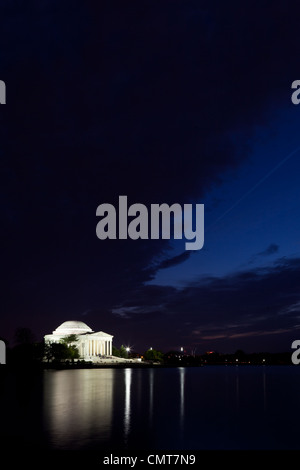 Thomas Jefferson Memorial with reflecting in the Tidal Basin in Washington DC at dusk with dramatic sky Stock Photo