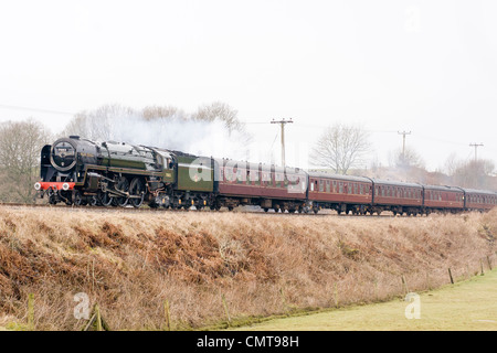 Steam locomotive pulling a passenger train on the East Lancs Railway at Burrs Country park Stock Photo
