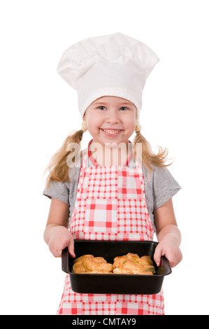 girl in chef's hat with baking isolated on white background Stock Photo