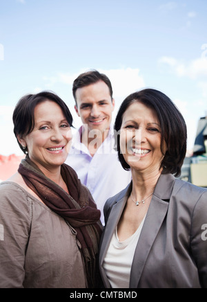 Group of three happy business colleagues Stock Photo