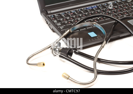 Stethoscope and laptop isolated on white background Stock Photo