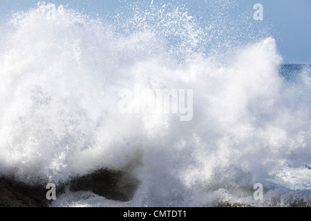 Heavy Atlantic rollers crashing onto rocks on the beach at Ajuy on the west coast of Fuerteventura, Canary Islands Stock Photo