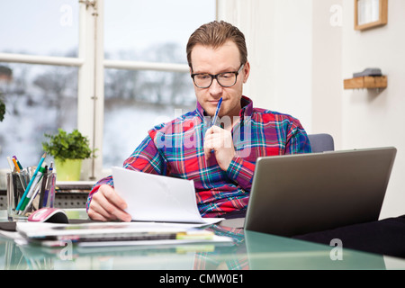 businessman thinking while at work Stock Photo