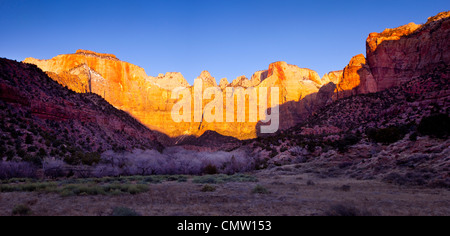 First light of dawn on the West Temple and the Towers of the Virgin, Zion National Park, Utah USA Stock Photo