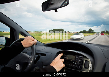 Man driving car on highway