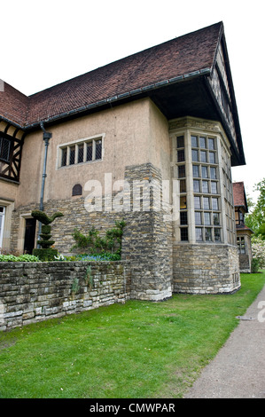A beautiful angular shot of the Cecilienhof palace in Germany taken during the daytime. Stock Photo